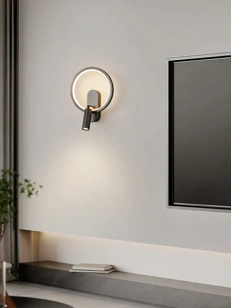 Modern black and silver wall lamp with adjustable spotlight for focused illumination featuring sleek matte finish decorbites brass copper led