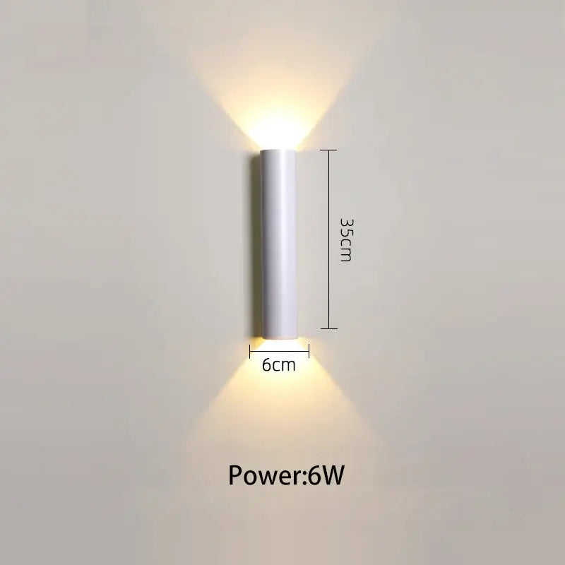 Modern black and silver led wall lamp with white cylindrical design for bedroom or tv background lighting