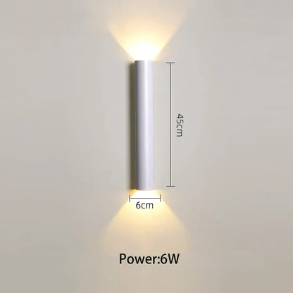 A sleek modern white led wall lamp with a 45cm height and 6cm width ideal for bedroom or tv background lighting