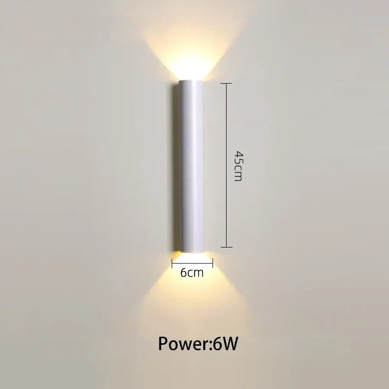 A sleek modern white led wall lamp with a 45cm height and 6cm width ideal for bedroom or tv background lighting