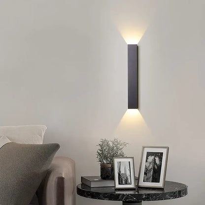 Modern black and silver led wall lamp with two warm downward lights for bedroom or tv background lighting