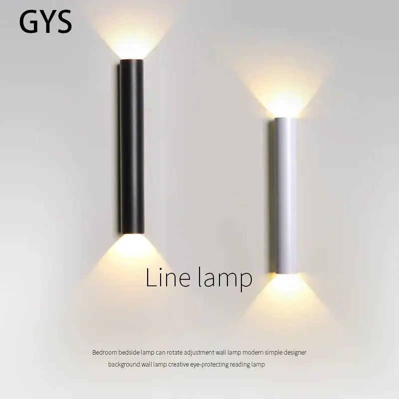 Modern black and silver led wall lamp with sleek cylindrical design emitting warm focused light for bedroom or tv background