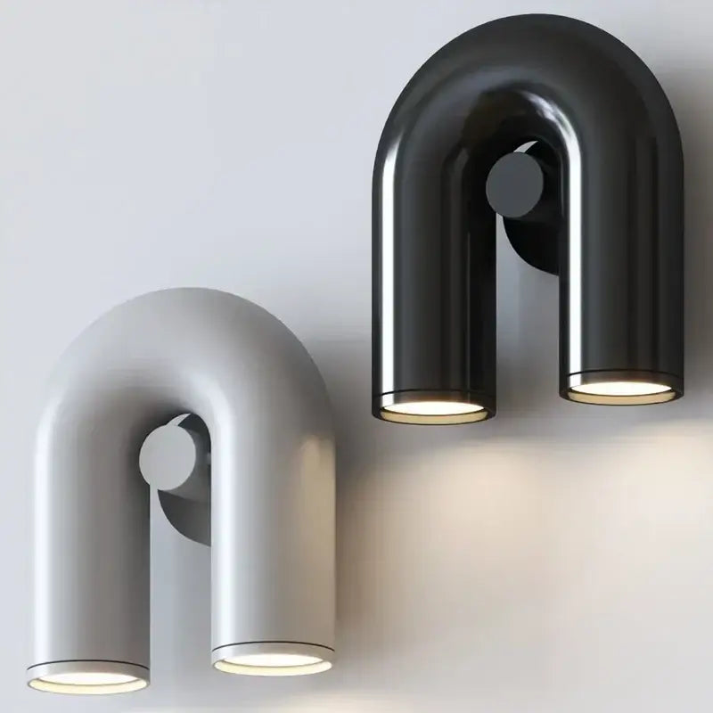 Modern black and silver minimalist tube wall lamp with two cylindrical fixtures for bedroom wall lighting
