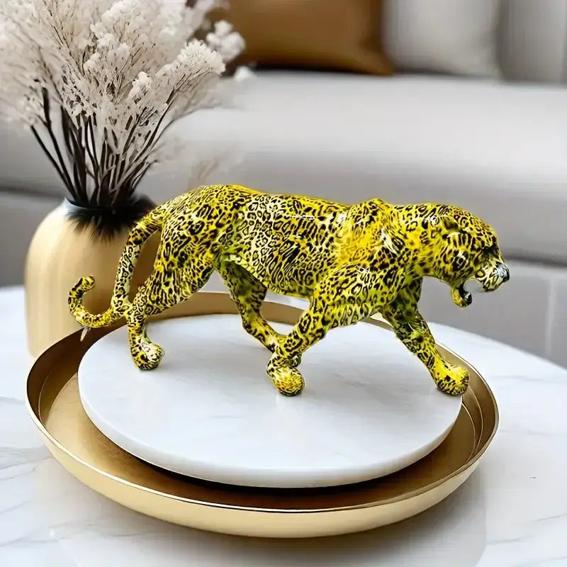 Vibrant yellow decorbites leopard panther figurine with bold black spots crafted from glossy resin for living room decor