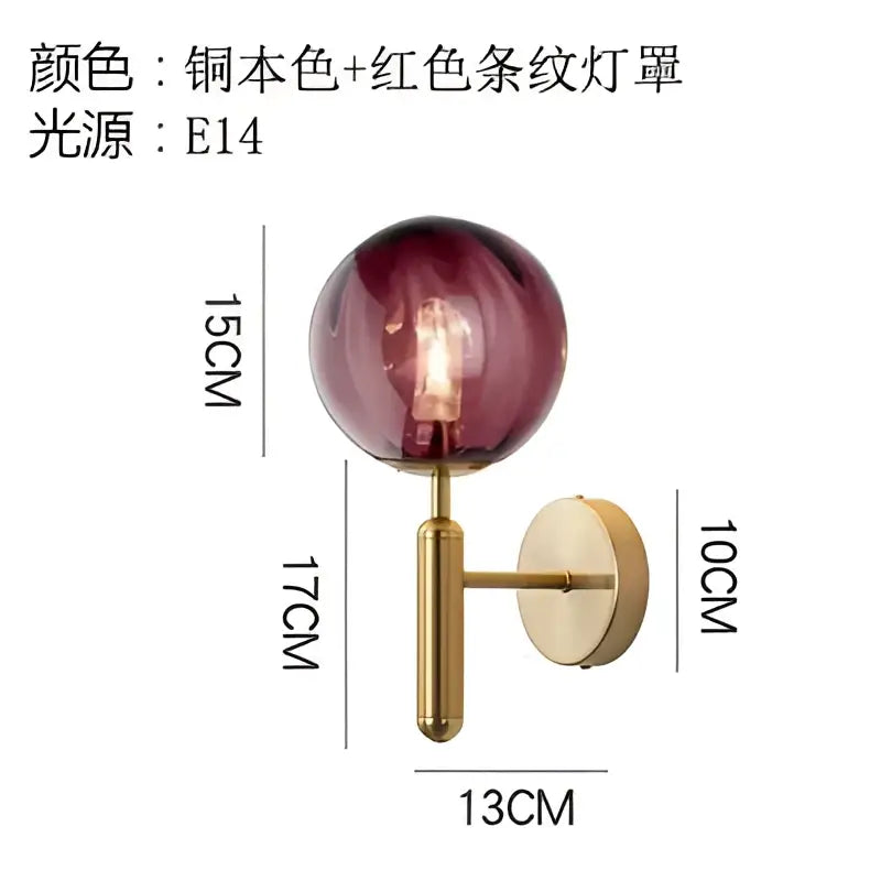 Modern black smoked glass ball led wall lamp with amber-tinted glass ball and brass-finished arm for bedroom decorbites