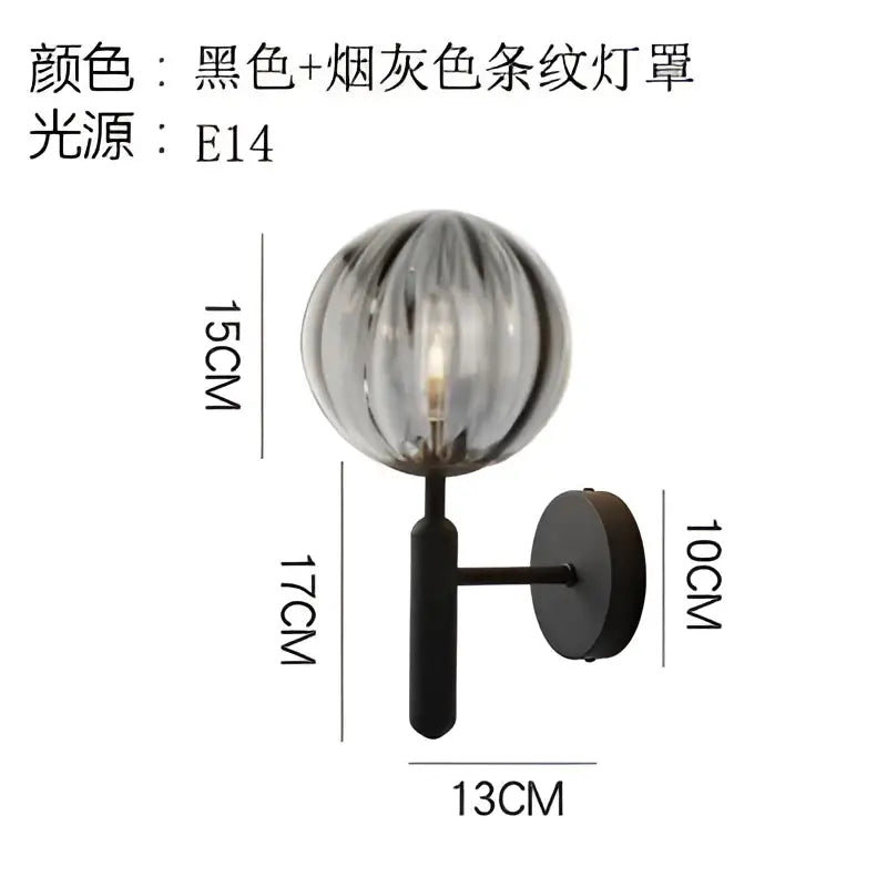 Modern black wall lamp with decorbites glass ball led featuring a textured smoked glass globe shade for bedroom use