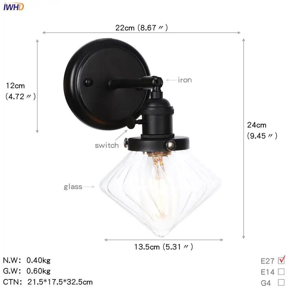Modern black iron wall sconce with a faceted clear glass ball shade ideal for decorbites glass ball wall lighting
