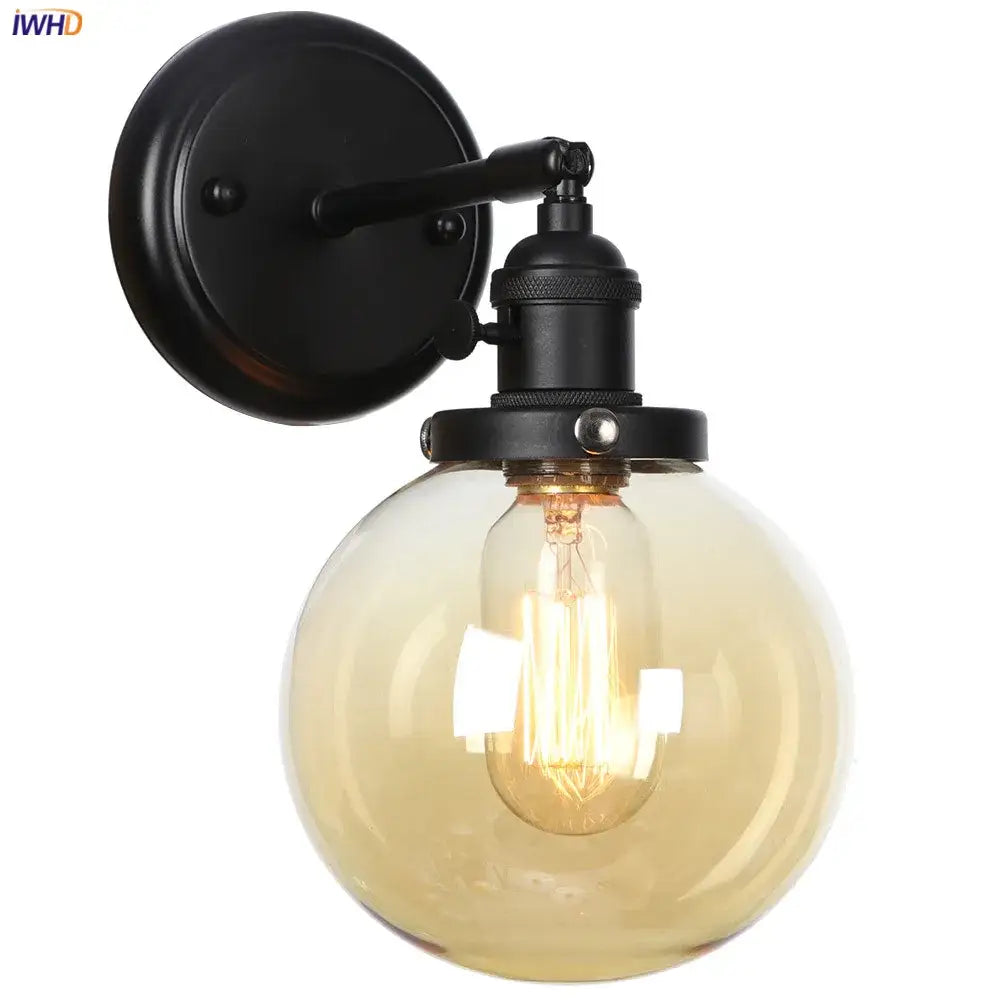 Modern black metal wall sconce with smoked glass ball and exposed filament bulb for minimalist decorbites glass ball wall lighting