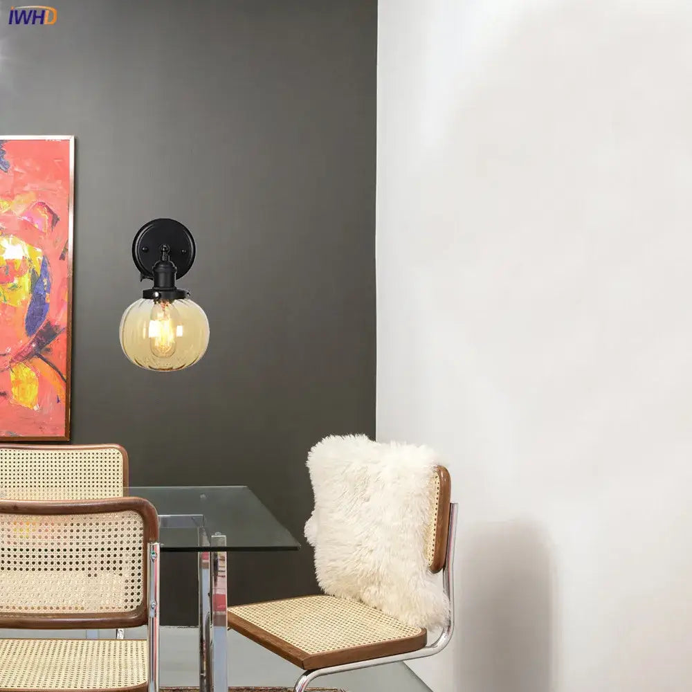 Modern black smoked glass ball wall sconce with frosted glass globe and exposed filament bulb for hallway decorbites glass ball wall