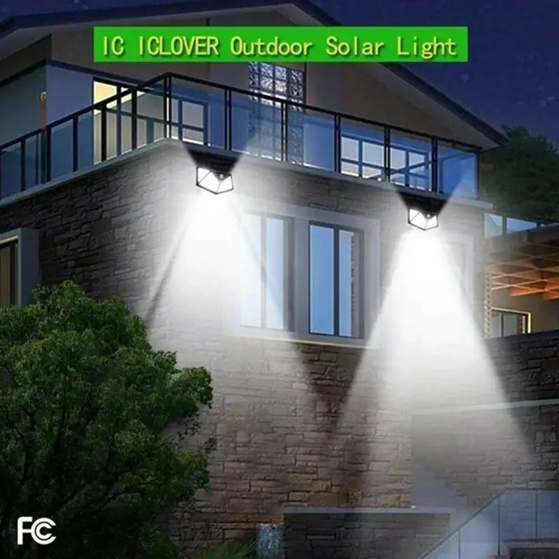 Modern black solar powered outdoor wall lamp with motion sensor shining bright white beams on stone house facade