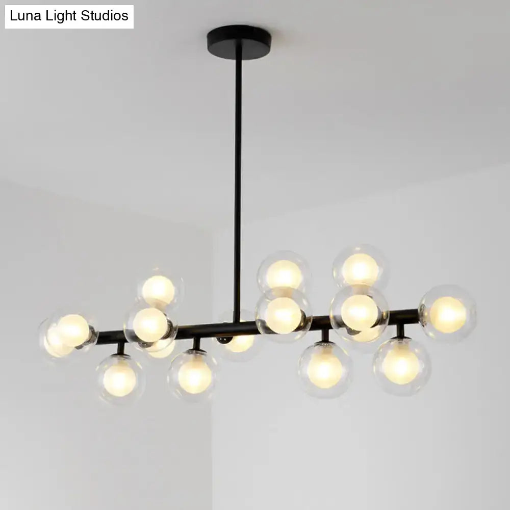 Modern black metal chandelier ceiling light featuring multiple clear spherical glass globe bulbs for dining room use