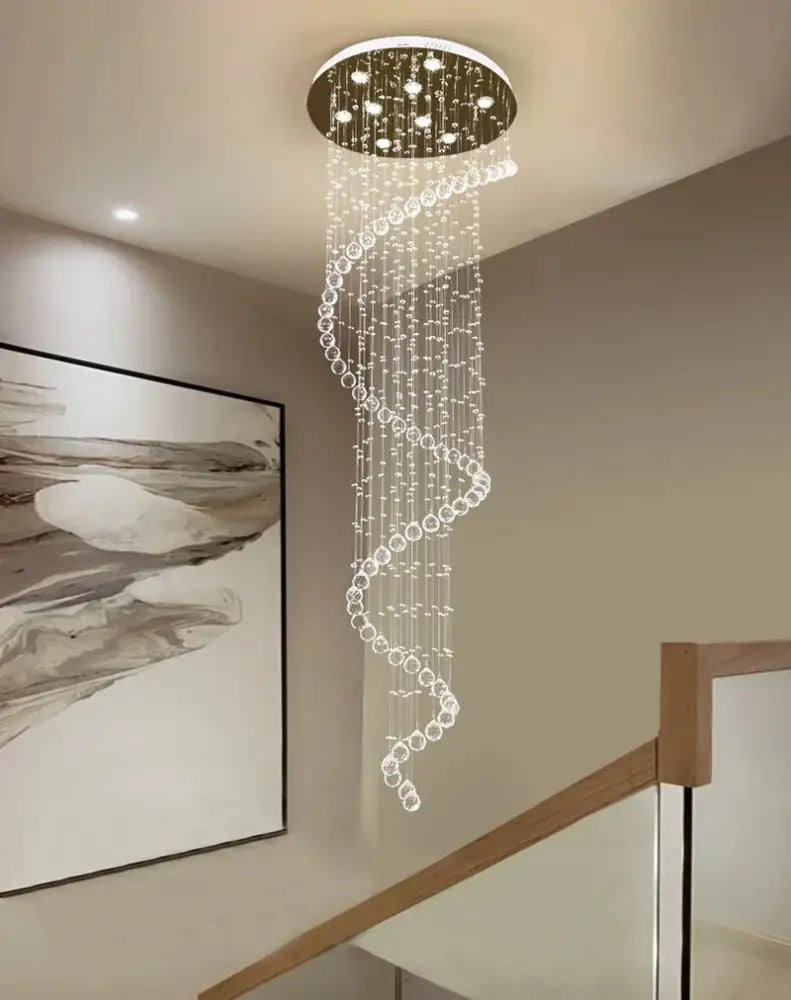Modern black spiral decorbites crystal pendant chandelier with gold-toned fixture and clear crystal beads for bedroom light