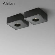 Modern black square led ceiling light with recessed circular fixtures featuring decorbites 12w for living room use