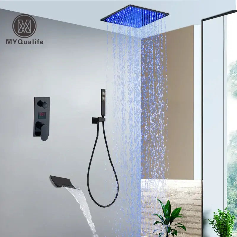 Modern black square shower faucet set featuring led rainfall head with blue lights for bathroom use
