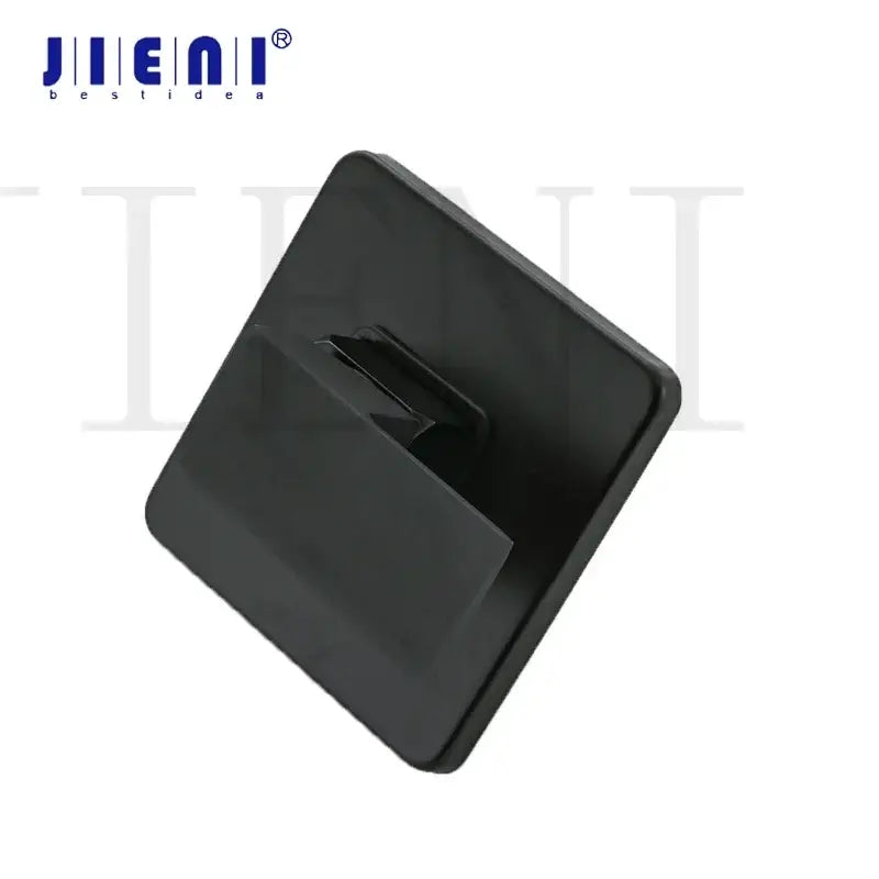 Modern black square wall mounted bathroom hook made of black plastic with smooth rounded edges for shower mixer use