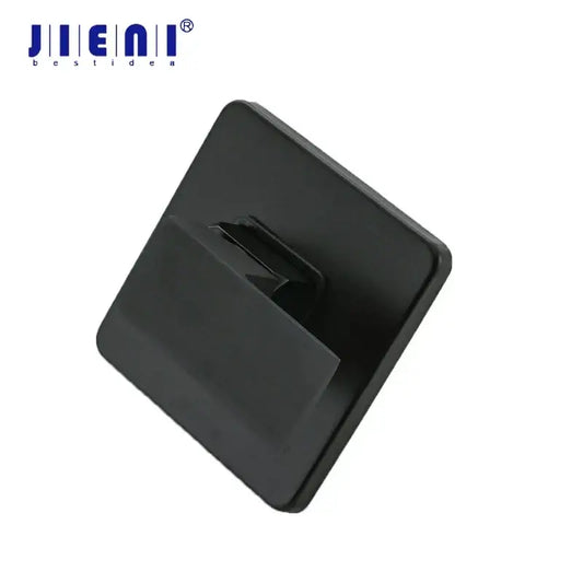 Modern black square wall mounted bathroom hook made of plastic with sleek design and smooth edges for shower mixer areas