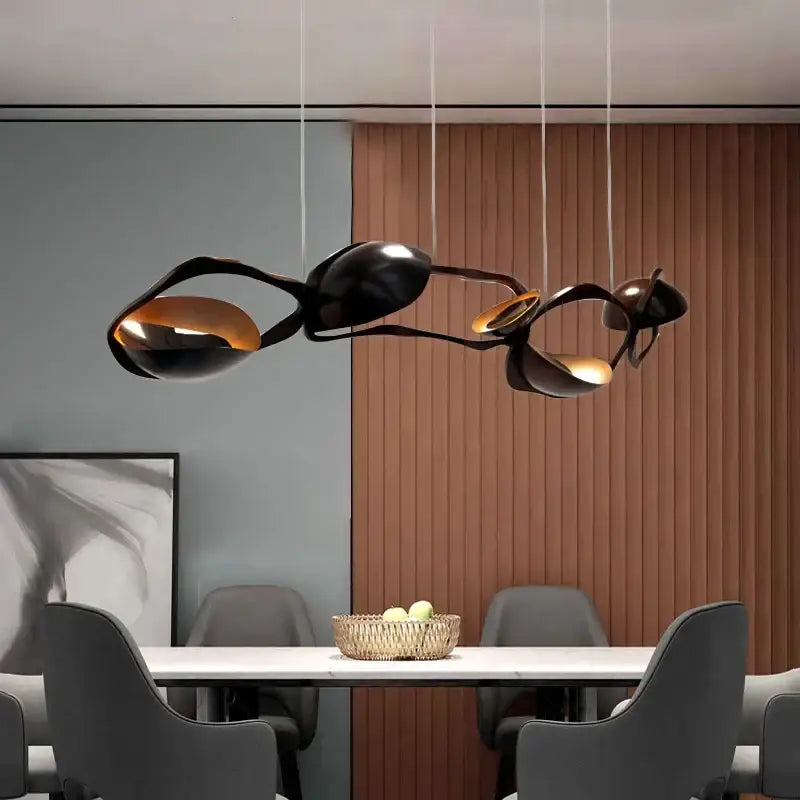 Modern black stainless steel chandelier featuring black and gold abstract sculptural pendant light for living room decor
