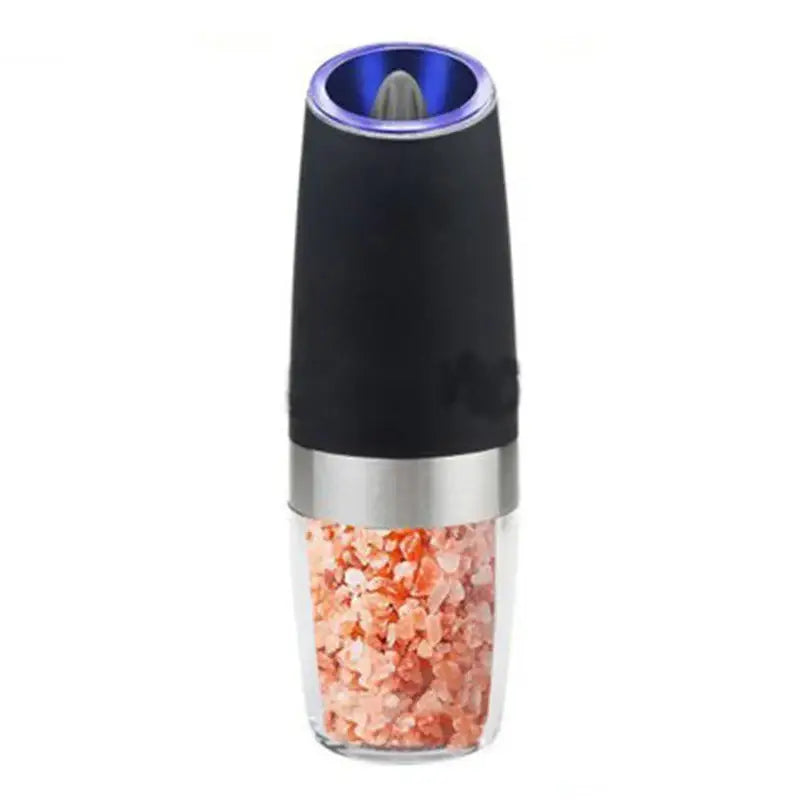 Modern black and stainless steel electric salt pepper grinder with blue led light filled with pink himalayan salt