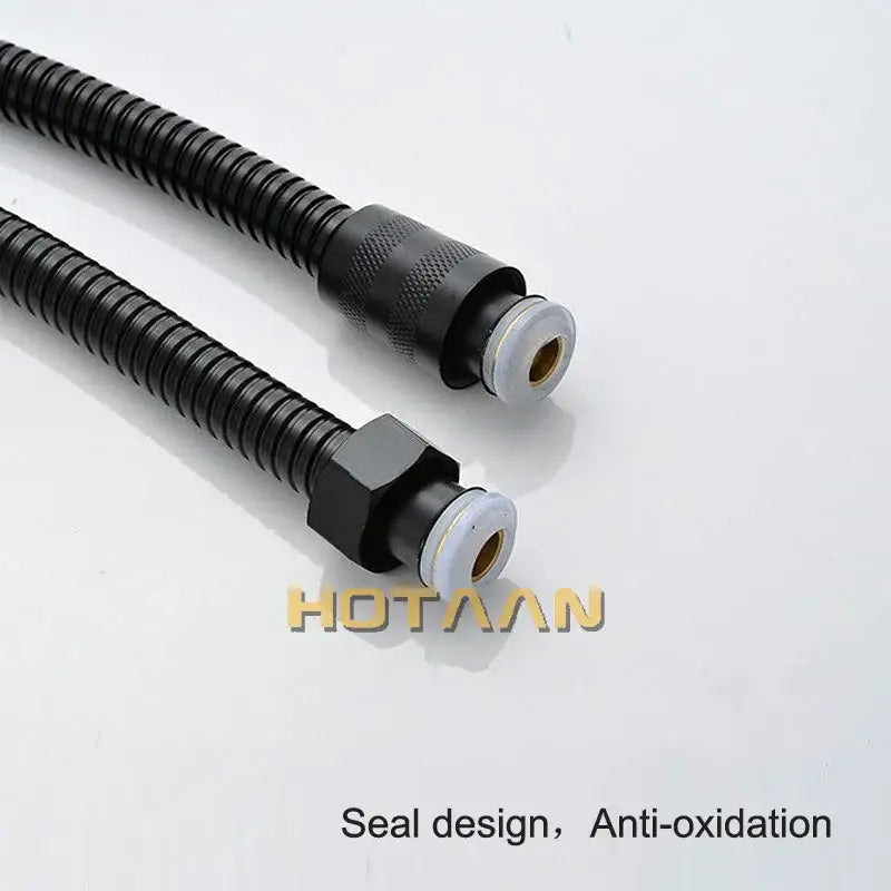 Modern black stainless steel flexible shower hose with black corrugated hose and metal fittings for bathroom use