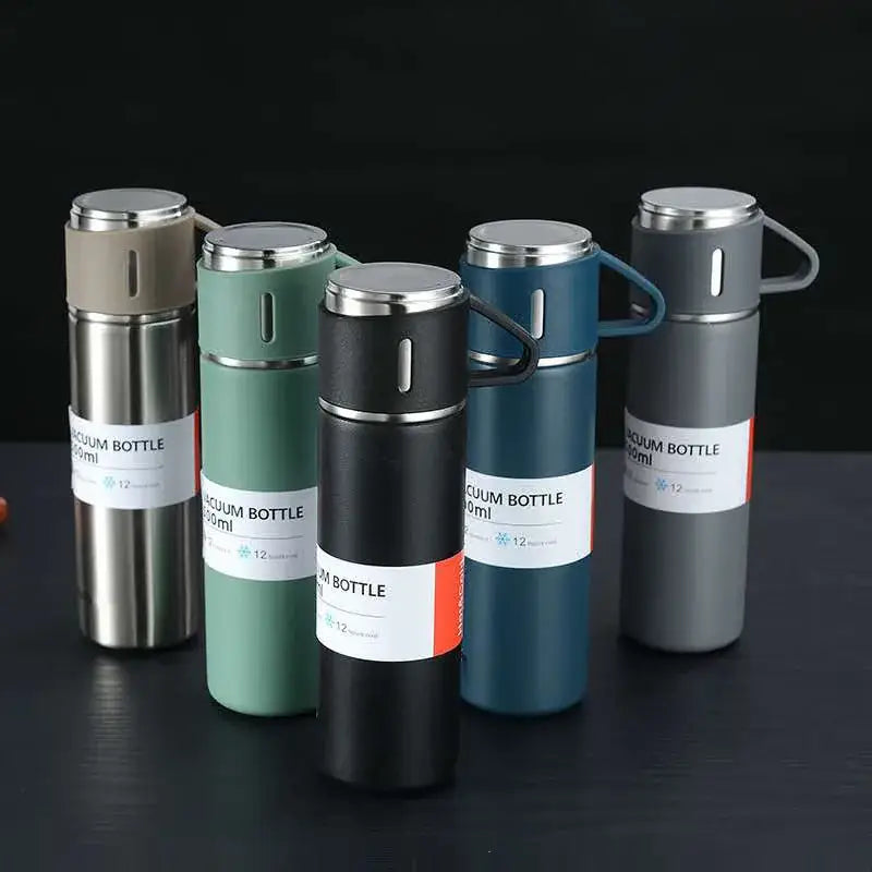 Modern black stainless steel insulated water bottle gift set with five vacuum insulated bottles in matte colors and handles