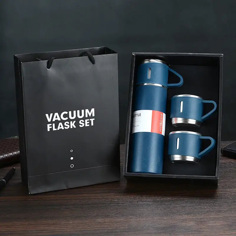 Modern black stainless steel insulated water bottle gift set with blue vacuum insulated water flask and matching mugs