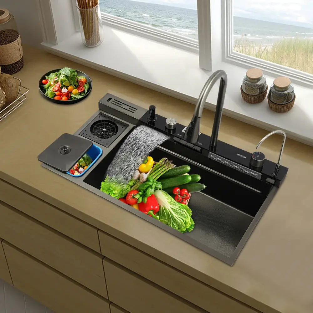 Modern black stainless steel single bowl kitchen sink with integrated faucet and built-in food waste disposal system