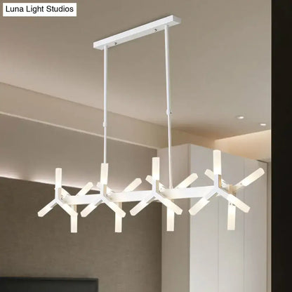 Modern DecorBites™ 18-light linear acrylic shade pendant chandelier in black white and gold with starburst design ideal over island