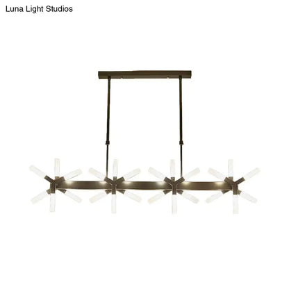 Modern bronze-finished pendant light with four starburst glass arms and linear acrylic shade for dining room lighting