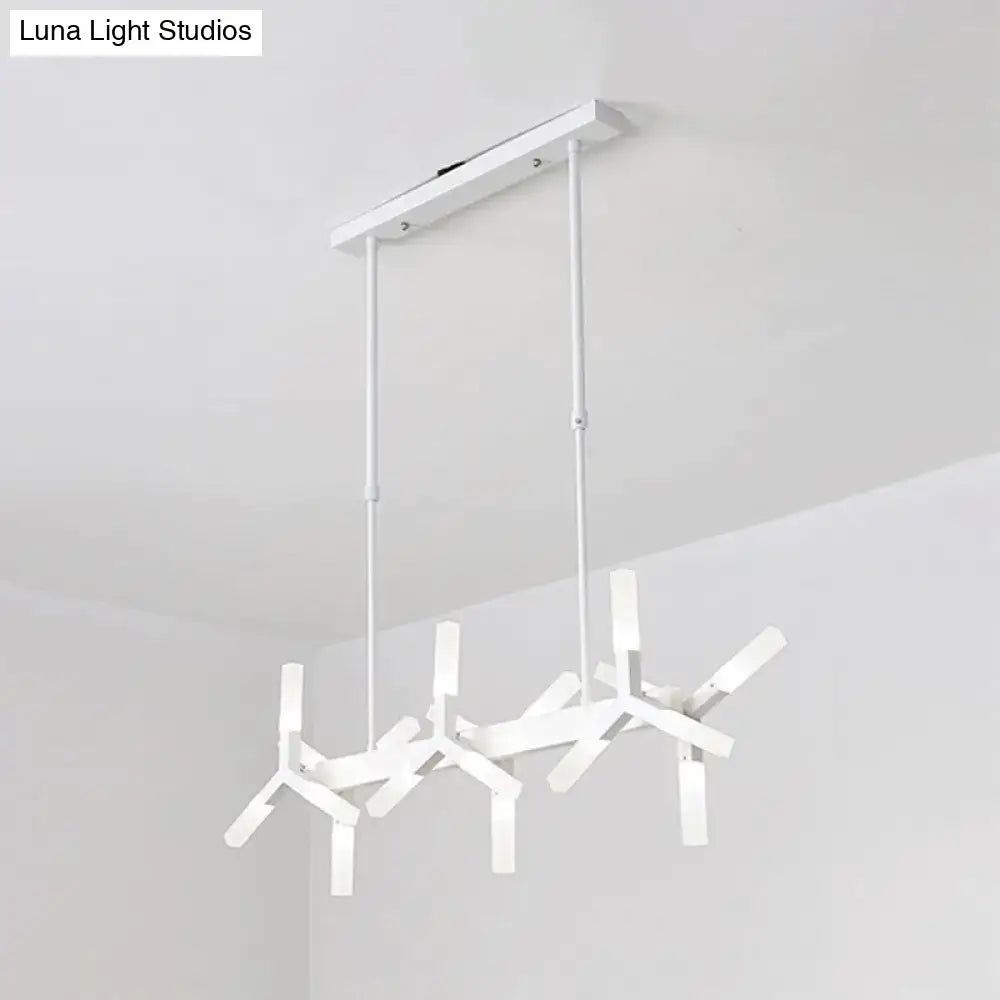 Modern white geometric pendant light with linear acrylic shade and sleek metal finish ideal over dining island