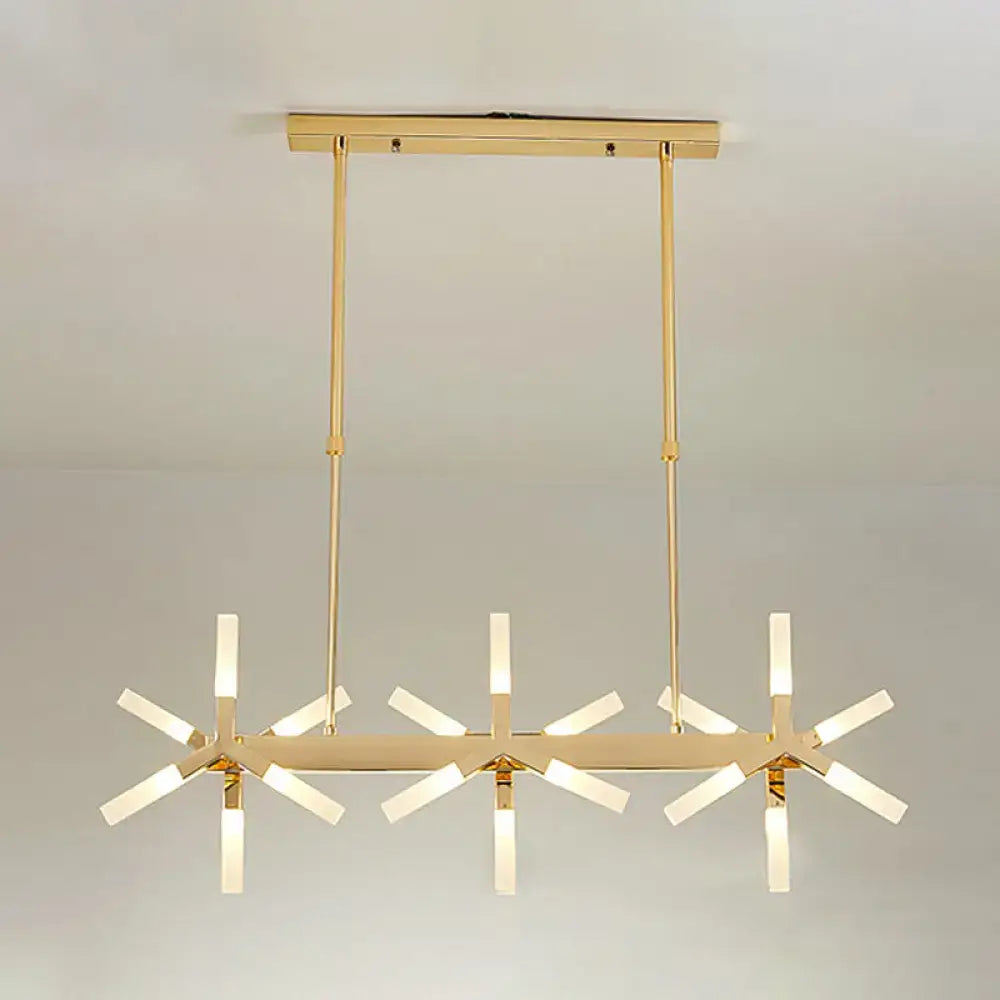 Gold-toned DecorBites linear acrylic shade chandelier with geometric starburst design and frosted glass arms for dining room