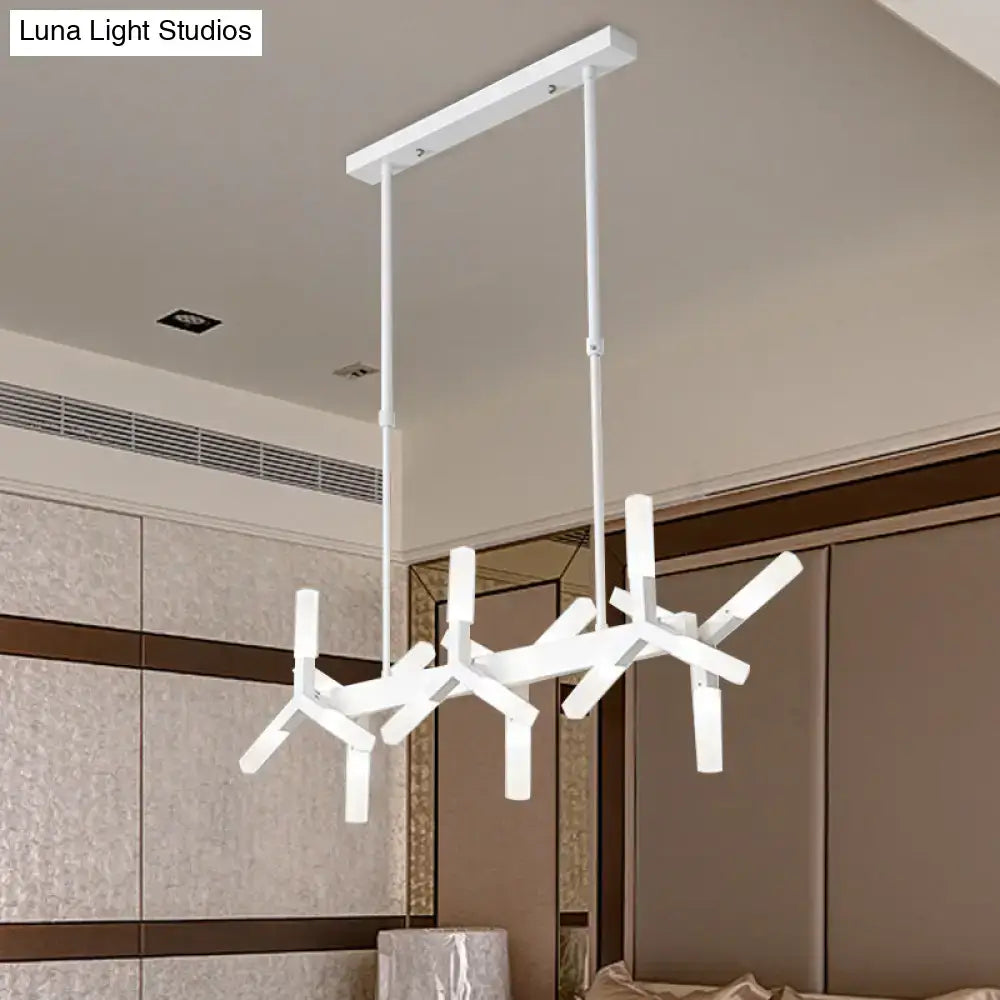 Modern white geometric chandelier with angular branch-like arms and linear acrylic shade for dining room by DecorBites