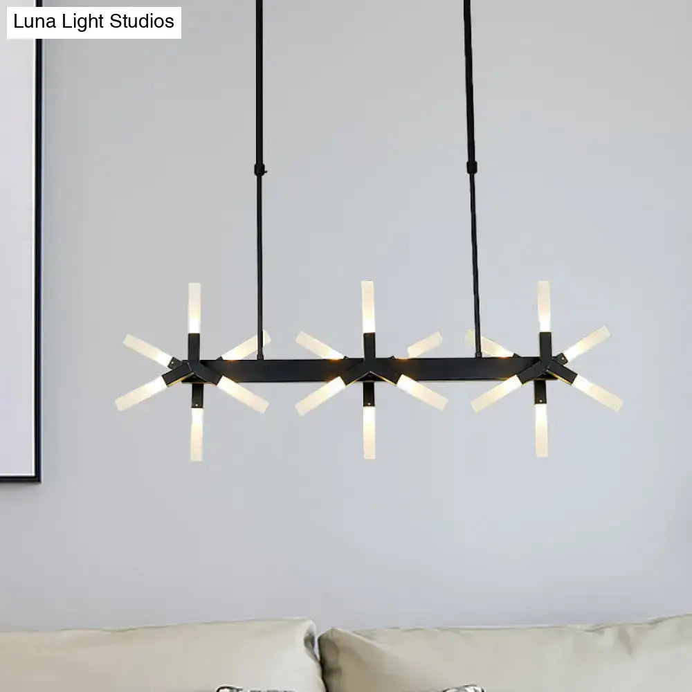 Modern black metal chandelier with three starburst arms featuring frosted glass linear acrylic shade fixtures ideal over island