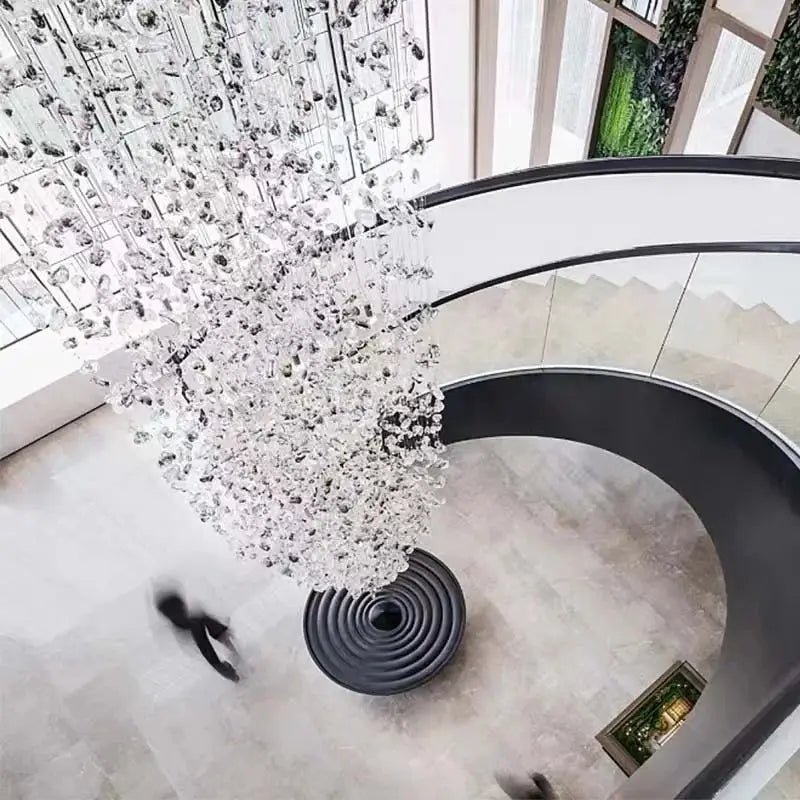 A modern black stone decorbites crystal chandelier with clear faceted crystals for staircase lighting