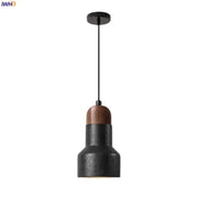 Modern black stone led pendant light with warm wood top and sleek black metal suspension for kitchen decorbites decor