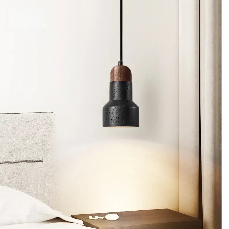 Modern black stone led pendant light with black matte finish and warm wood top by decorbites for kitchen decor