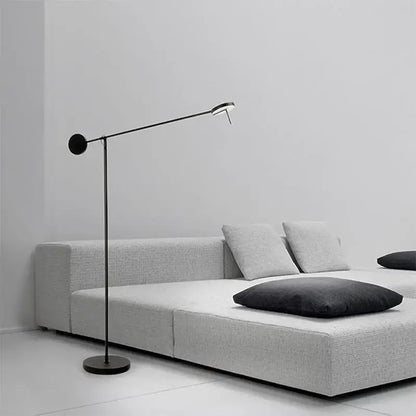 Minimalist black telescopic wall lamp with slender articulated arm and circular base for modern bedroom decorbites lighting