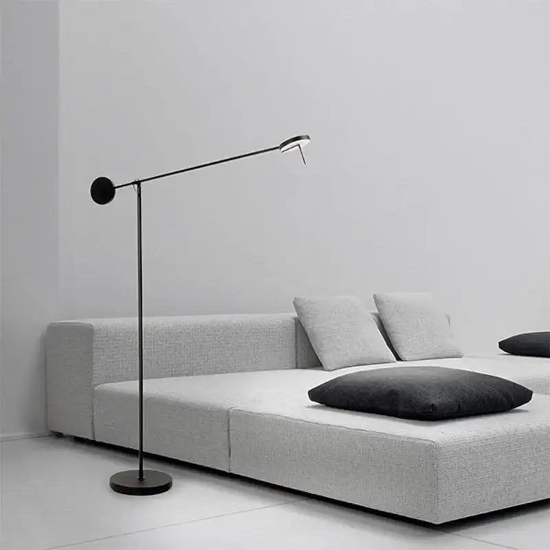 Minimalist black telescopic wall lamp with slender articulated arm and circular base for modern bedroom decorbites lighting