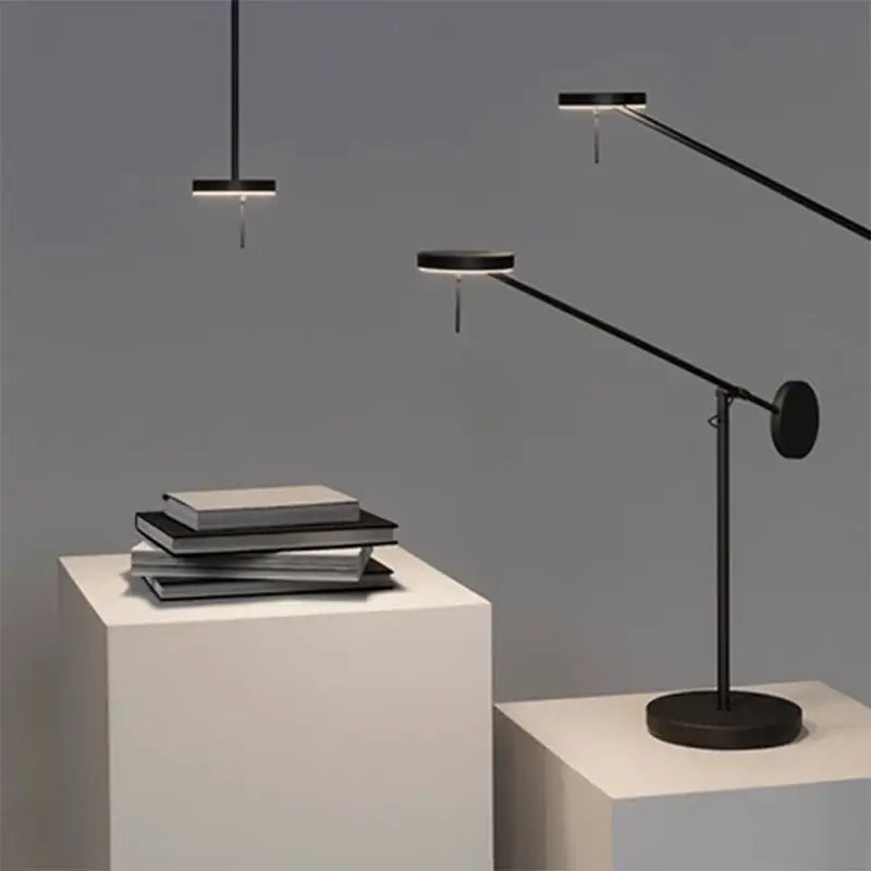 Modern black telescopic wall lamp with adjustable arm and circular light head for minimalist bedroom decorbites black telescopic lighting