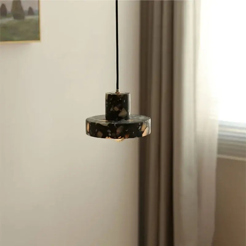 Modern black terrazzo led pendant lamp featuring black and gold speckled design for dining room decorbites pendant lamp
