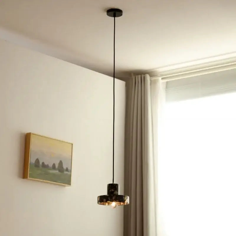 Modern black terrazzo led pendant lamp with sleek black marble and gold accents for dining room decorbites pendant lamp