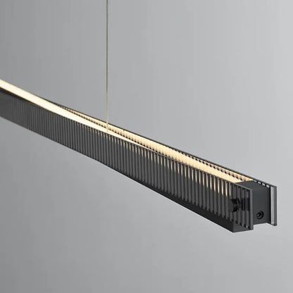 Modern black textured bar shape pendant light with matte finish ribbed design and warm led illumination for dining room decorbites bar shape