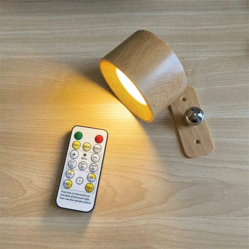 A warm-toned cylindrical wooden led wall light with visible grain and remote for adjustable brightness and color temperature