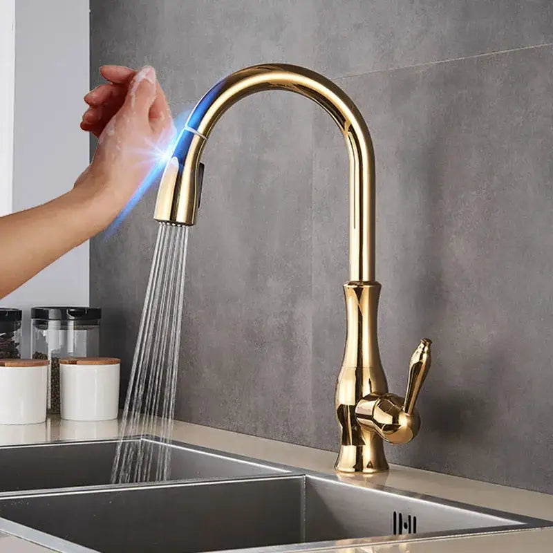 Gold-colored modern kitchen faucet with curved spout and pull-down spray head by decorbites black touch sensor