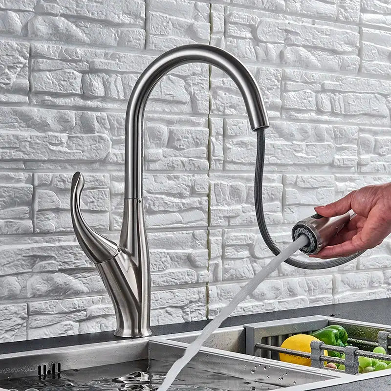 Modern stainless steel kitchen faucet with curved spout and pull-out spray head from decorbites black touch sensor series