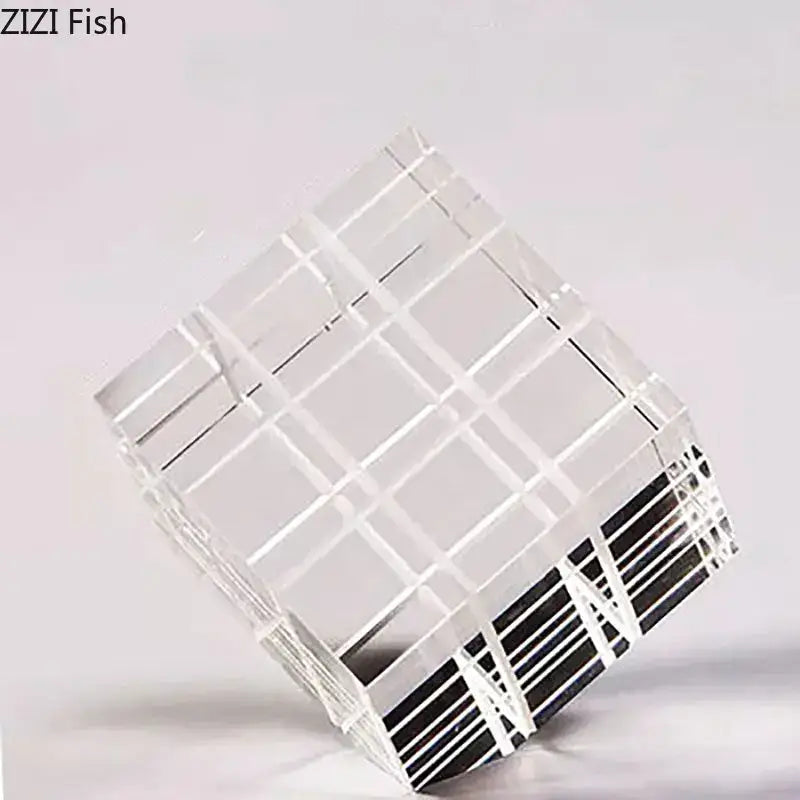 Modern black and transparent acrylic crystal magic cube desk ornament with grid pattern and black striped accents for office decor