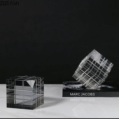 Clear acrylic cube-shaped desk ornament with grid pattern and engraved marc jacobs branding decorbites crystal magic cube