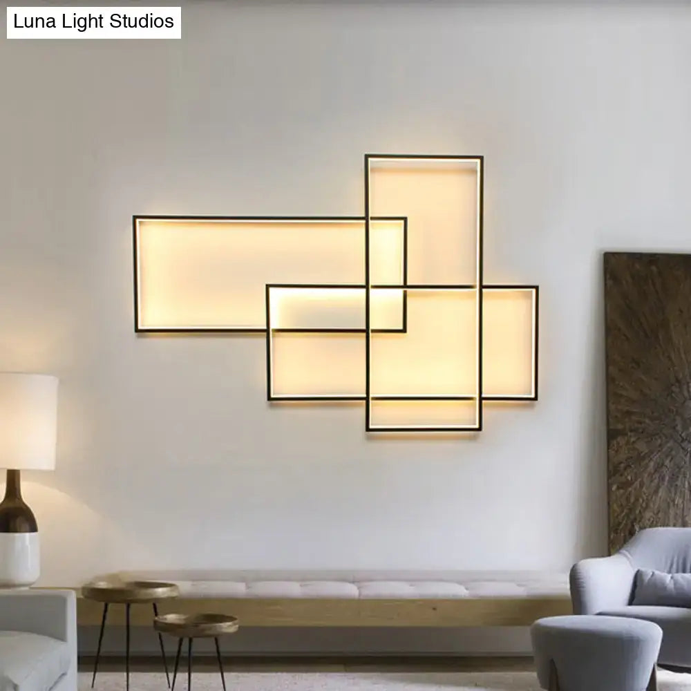 Modern black traverse wall light with geometric black frames and warm white glowing rectangular panels for living room