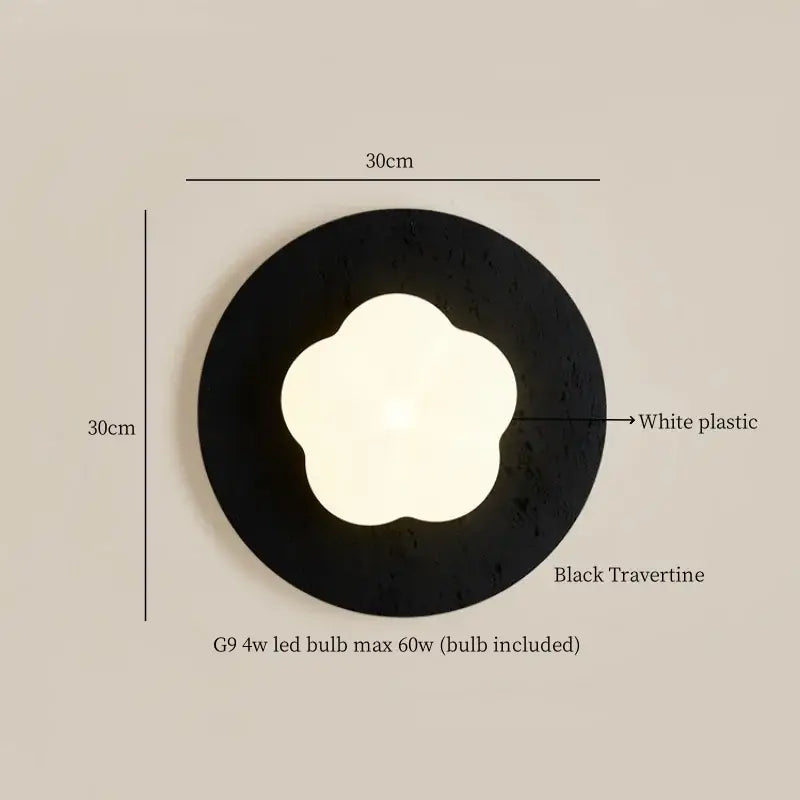 Modern black travertine flower led wall light featuring a circular black travertine sconce with white flower fixture by decorbites