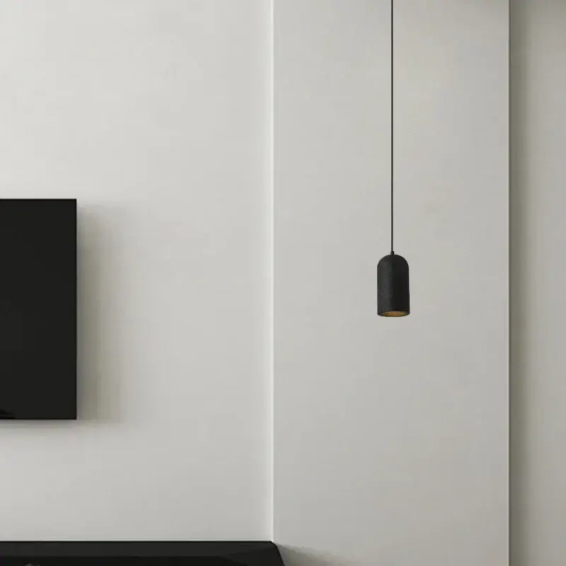 Modern black travertine led pendant lamp with matte cylindrical shade and gold interior lining for kitchen decorbites black travertine