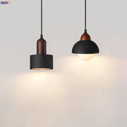 Modern black travertine pendant light with black textured concrete and wooden accents ideal for bedroom decorbites black travertine